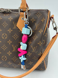Charm/portachiavi fucsia