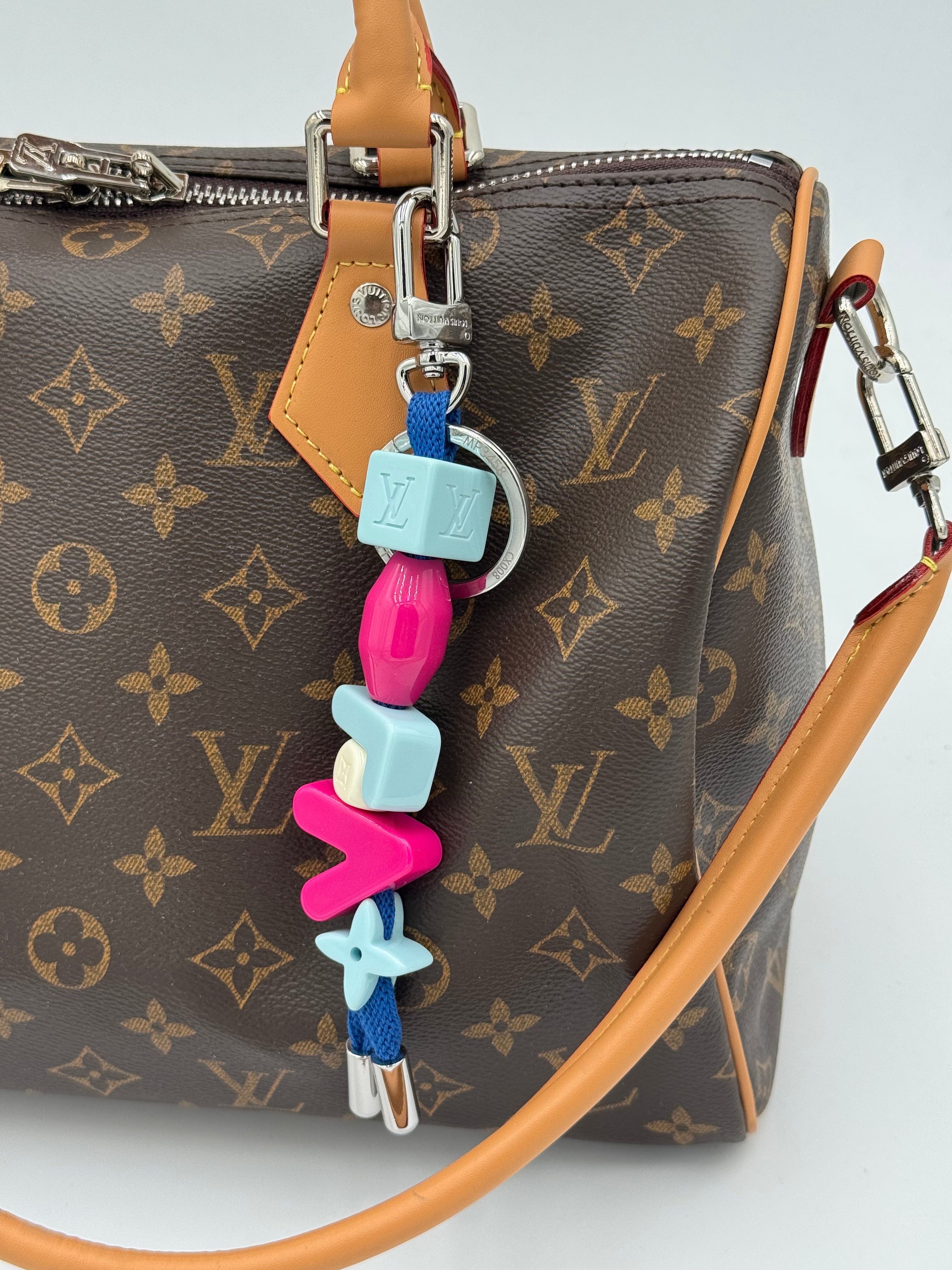 Charm/portachiavi fucsia